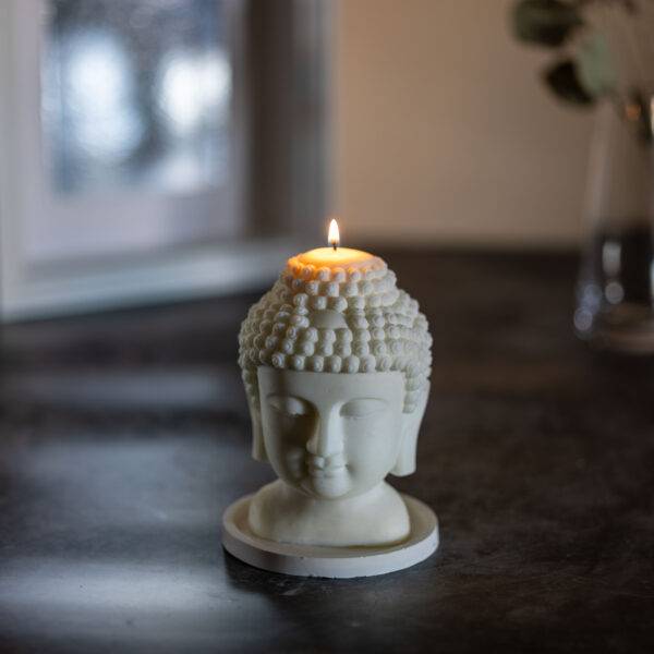 bougie parfumée artisanale en forme de tête de Buddha