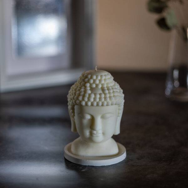 bougie parfumée artisanale en forme de tête de Buddha